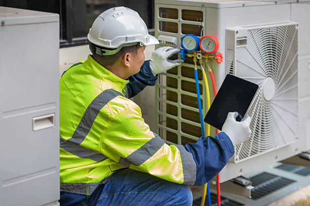 Professional Air Duct Cleaning technician working in Dayville, CT